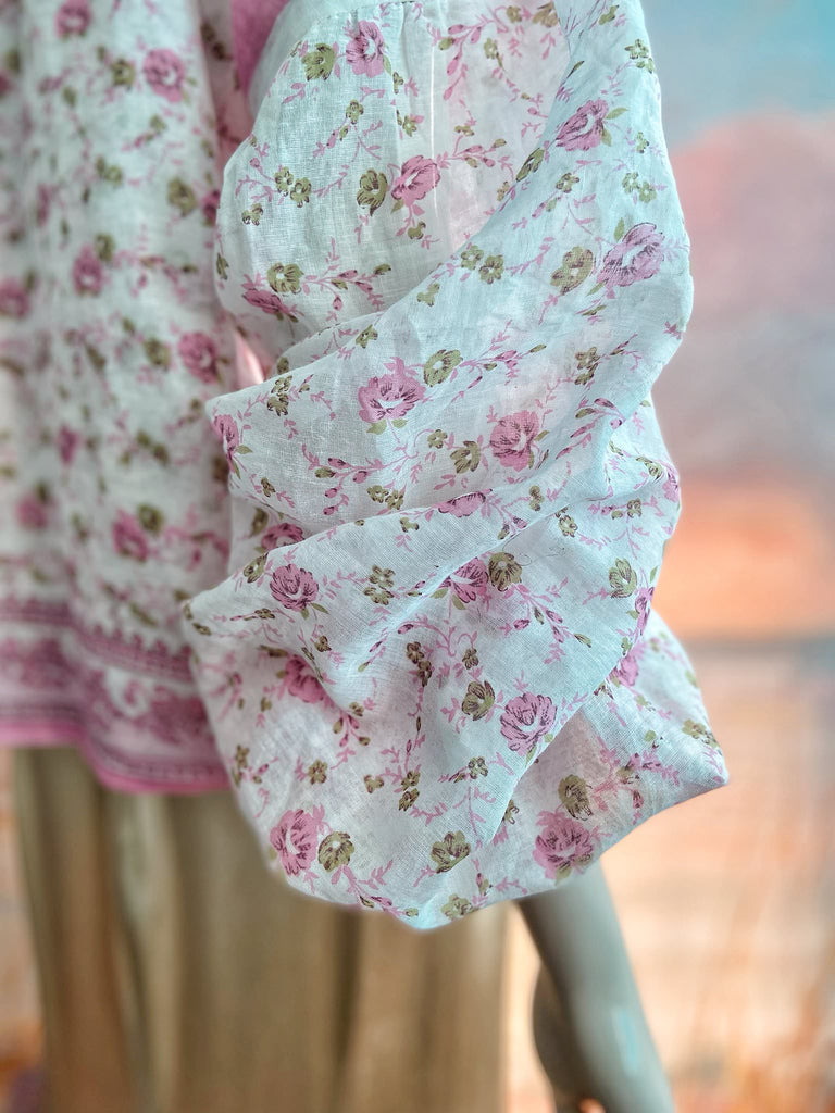 Rose pink and ivory cotton voile blouse with long full sleeves and adjustable drawstring neckline. Bohemian styles sustainably created from antique and vintage textiles by the Pavilion Parade studio. 