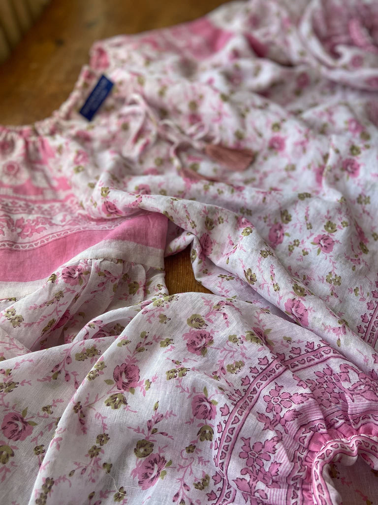 Rose pink and ivory cotton voile blouse with long full sleeves and adjustable drawstring neckline. Bohemian styles sustainably created from antique and vintage textiles by the Pavilion Parade studio. 