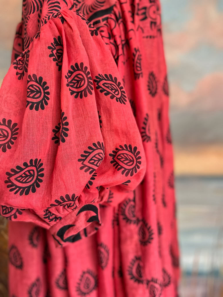 Vibrant pink and black block printed fine cotton muslin volume dress.  Balloon sleeves, ankle length, with pockets. Unique bohemian garments sustainably created from antique and vintage textiles by the Pavilion Parade studio.