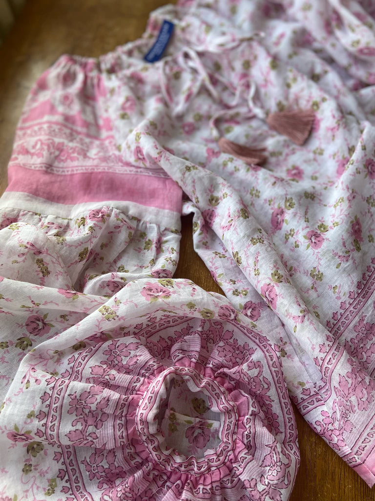 Rose pink and ivory cotton voile blouse with long full sleeves and adjustable drawstring neckline. Bohemian styles sustainably created from antique and vintage textiles by the Pavilion Parade studio. 