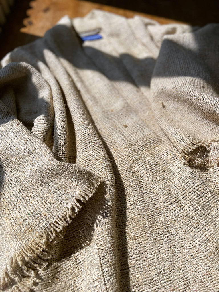 Full length kimono inspired robe with large patch pockets. Newly created from a bolt end of vintage raw silk with the colour and texture of antique hemp grain sacks. All French seamed with hand finished hems and collar. Bohemian styles sustainably created from antique and vintage textiles by the Pavilion Parade studio.