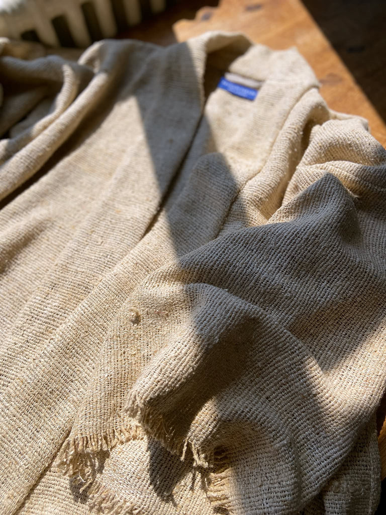 Full length kimono inspired robe with large patch pockets. Newly created from a bolt end of vintage raw silk with the colour and texture of antique hemp grain sacks. All French seamed with hand finished hems and collar. Bohemian styles sustainably created from antique and vintage textiles by the Pavilion Parade studio.