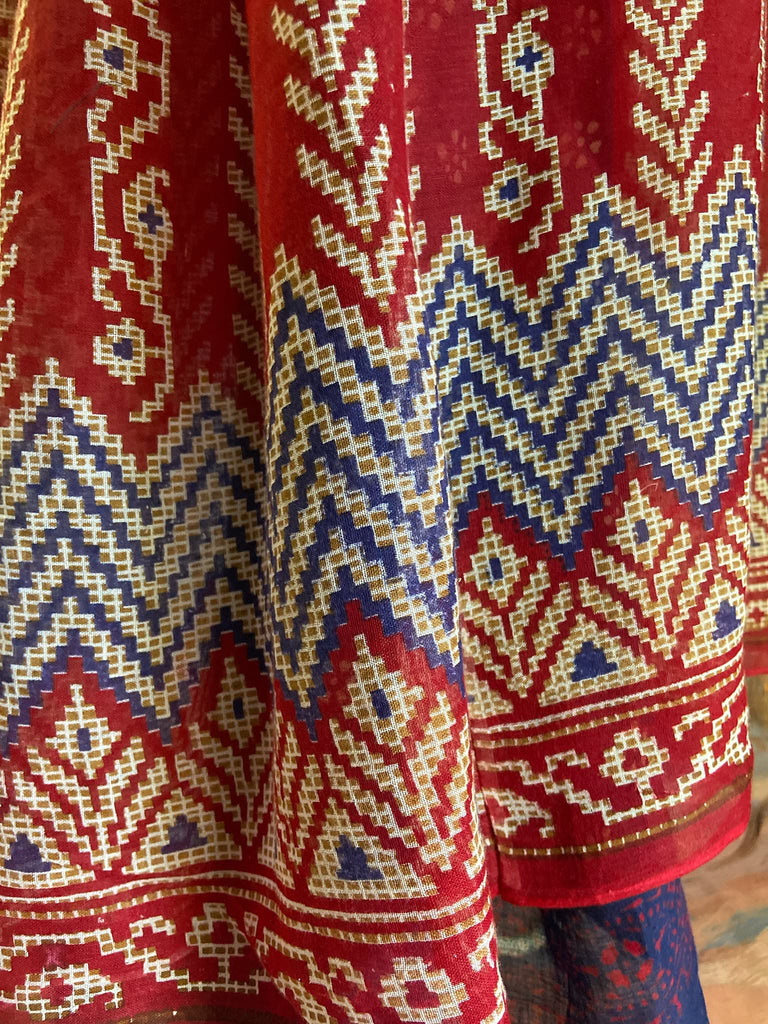 Red, blue and white volume cotton muslin midi maxi dress with balloon sleeves and pockets. Bohemian style sustainably created from vintage and antique textiles by the Pavilion Parade studio. 