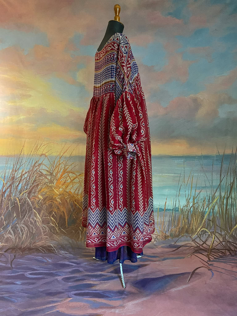 Red, blue and white volume cotton muslin midi maxi dress with balloon sleeves and pockets. Bohemian style sustainably created from vintage and antique textiles by the Pavilion Parade studio. 