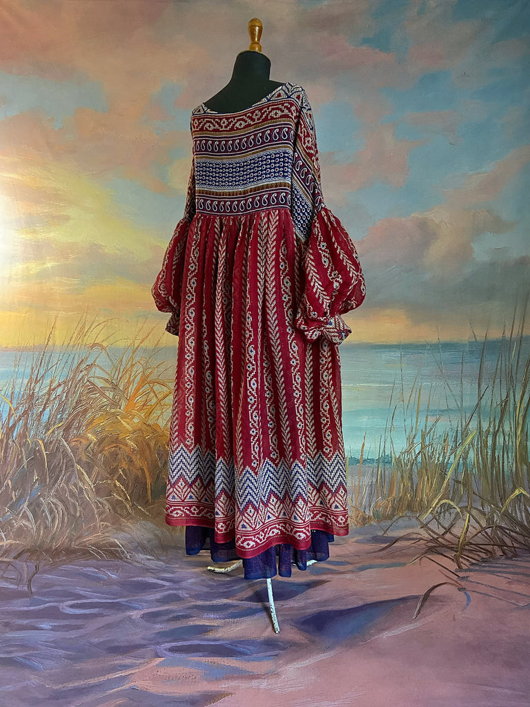 Red, blue and white volume cotton muslin midi maxi dress with balloon sleeves and pockets. Bohemian style sustainably created from vintage and antique textiles by the Pavilion Parade studio. 