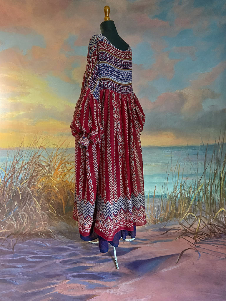 Red, blue and white volume cotton muslin midi maxi dress with balloon sleeves and pockets. Bohemian style sustainably created from vintage and antique textiles by the Pavilion Parade studio. 