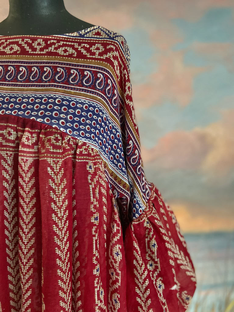 Red, blue and white volume cotton muslin midi maxi dress with balloon sleeves and pockets. Bohemian style sustainably created from vintage and antique textiles by the Pavilion Parade studio. 