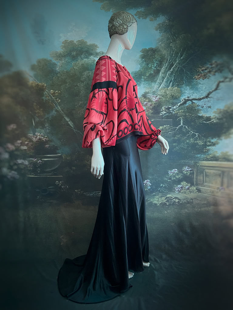 Scarlet red and ebony black silk georgette blouse with long full sleeves and adjustable drawstring neckline. Bohemian styles sustainably created from antique and vintage textiles by the Pavilion Parade studio. 