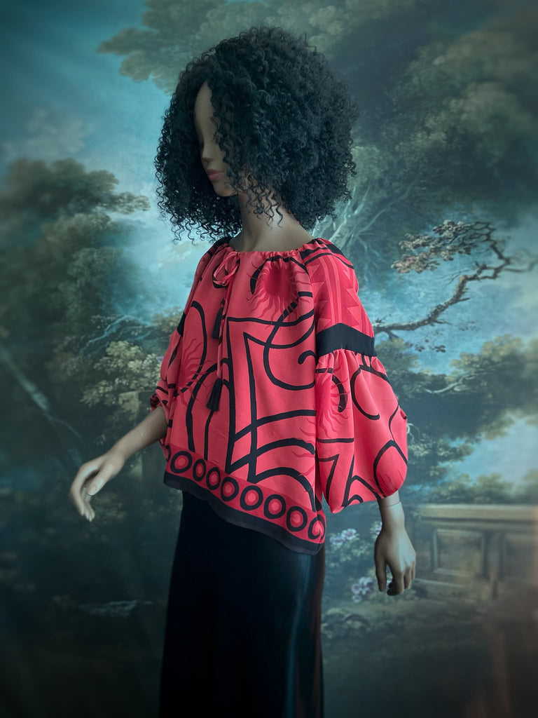 Scarlet red and ebony black silk georgette blouse with long full sleeves and adjustable drawstring neckline. Bohemian styles sustainably created from antique and vintage textiles by the Pavilion Parade studio. 