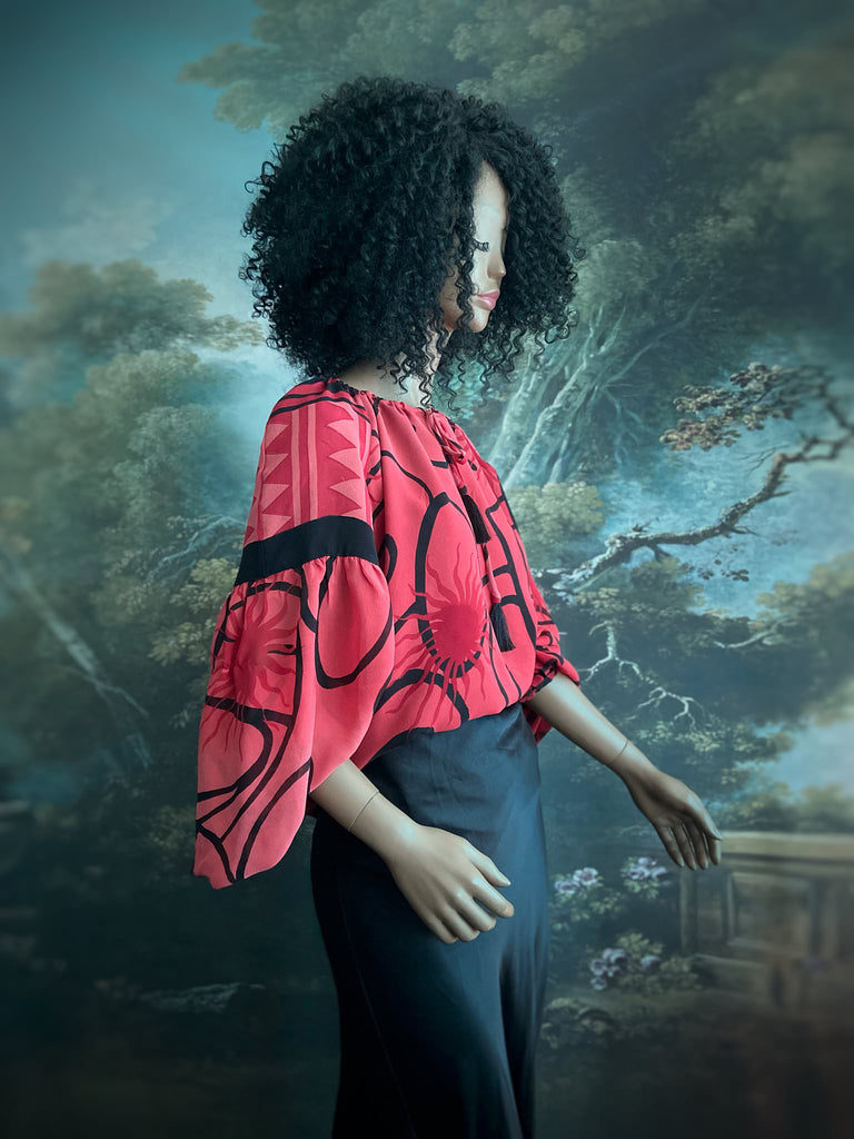Scarlet red and ebony black silk georgette blouse with long full sleeves and adjustable drawstring neckline. Bohemian styles sustainably created from antique and vintage textiles by the Pavilion Parade studio. 