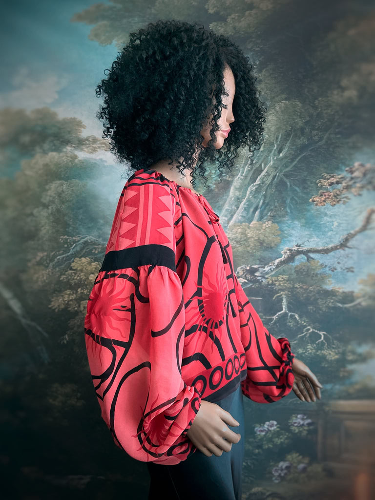 Scarlet red and ebony black silk georgette blouse with long full sleeves and adjustable drawstring neckline. Bohemian styles sustainably created from antique and vintage textiles by the Pavilion Parade studio. 
