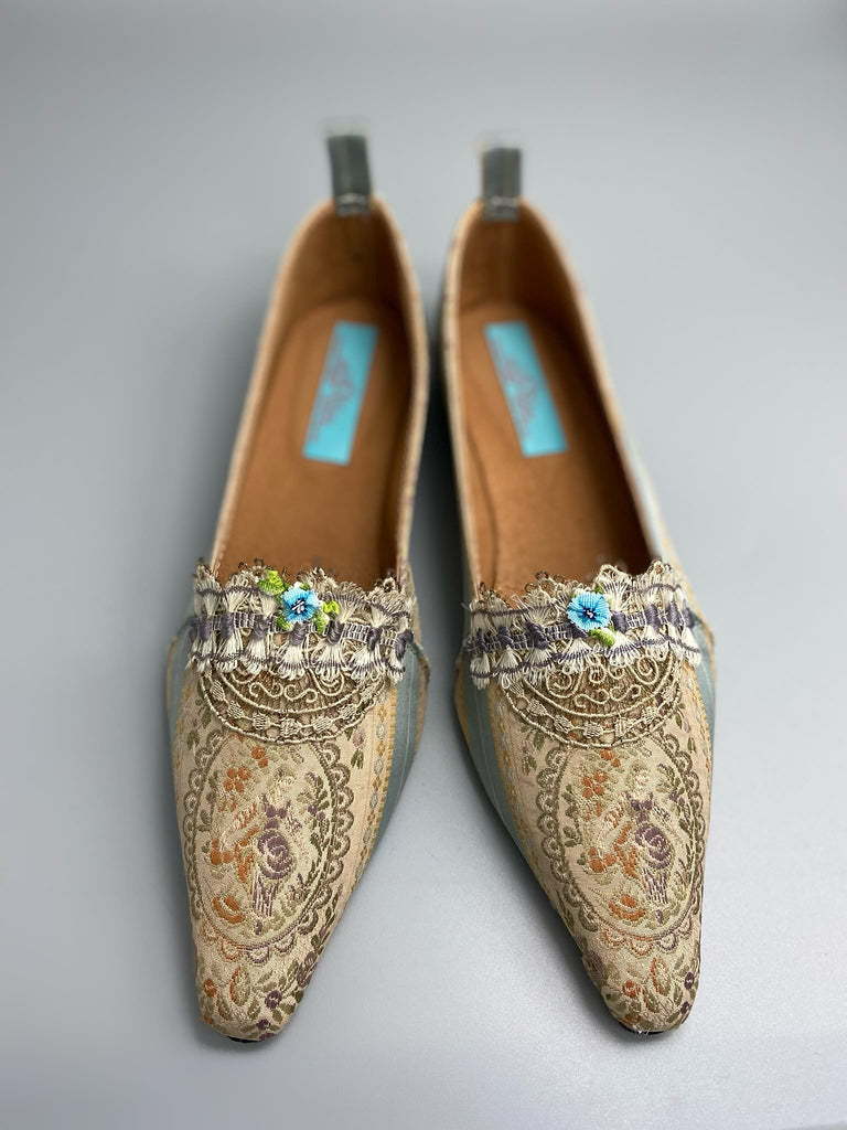 Pale blue and ecru silk brocade Regency inspired dancing slippers with rare 18th century silk fly  fringe embellishment . Bohemian style sustainably created from antique textiles by the Pavilion Parade studio.