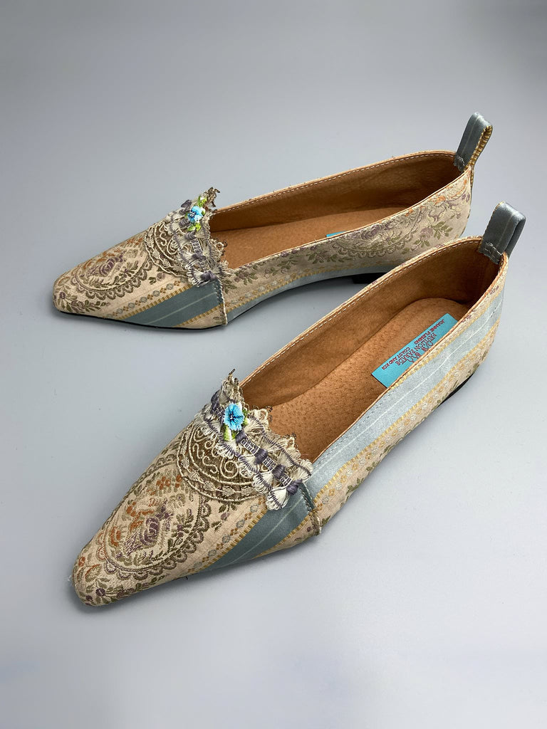 Pale blue and ecru silk brocade Regency inspired dancing slippers with rare 18th century silk fly  fringe embellishment . Bohemian style sustainably created from antique textiles by the Pavilion Parade studio.