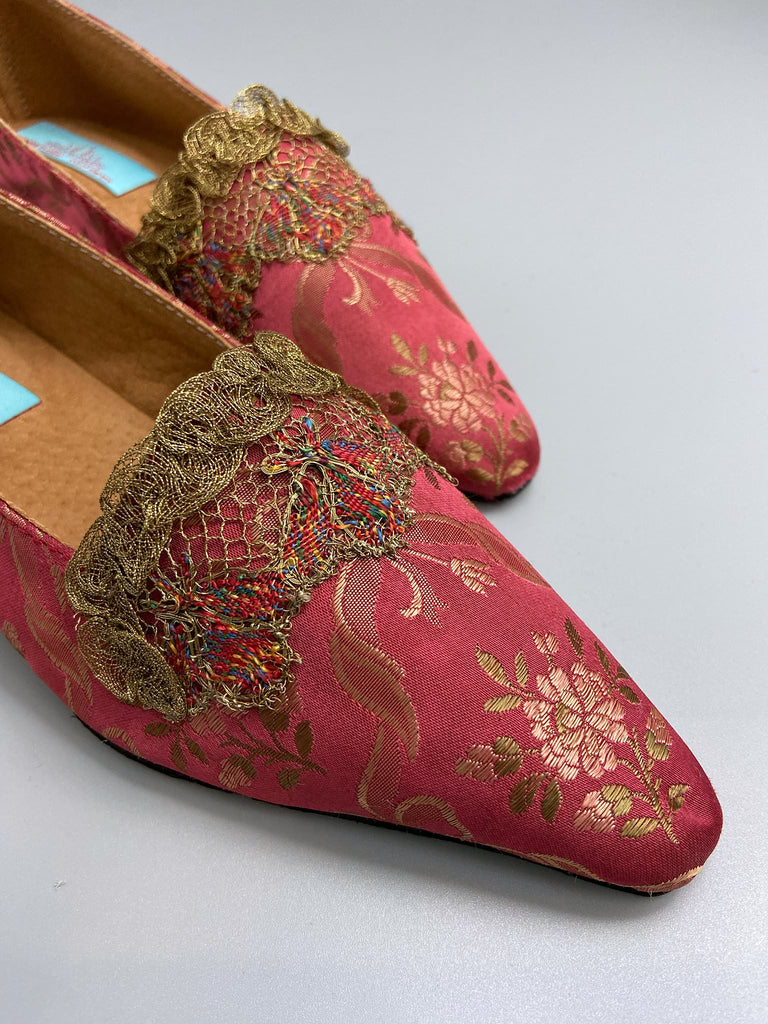 Deep rose pink silk brocade Regency inspired dancing slippers with metallic gold filigree lace embellishment and silk satin ankle ribbons. Bohemian style sustainably created from antique textiles by the Pavilion Parade studio.