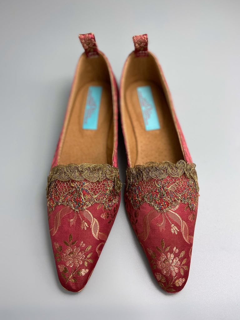 Deep rose pink silk brocade Regency inspired dancing slippers with metallic gold filigree lace embellishment and silk satin ankle ribbons. Bohemian style sustainably created from antique textiles by the Pavilion Parade studio.