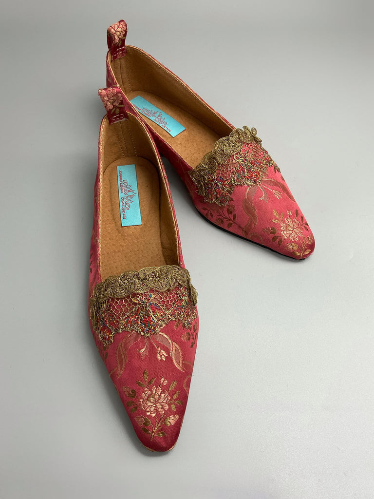 Deep rose pink silk brocade Regency inspired dancing slippers with metallic gold filigree lace embellishment and silk satin ankle ribbons. Bohemian style sustainably created from antique textiles by the Pavilion Parade studio.