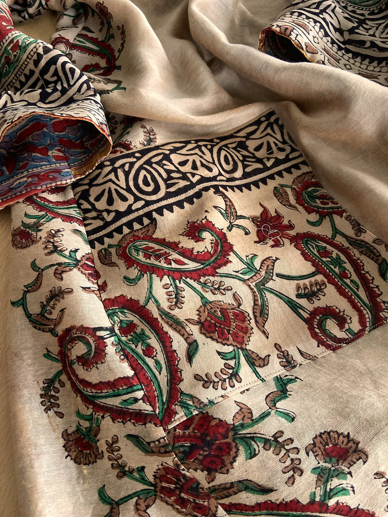 Reversible block printed kalamkari cotton kaftan dress. Slate blue and rust Indienne paisley and floral motif. Deep pockets, wide sleeves and a relaxed fit. Bohemian style created from vintage and antique textiles by the Pavilion Parade studio.