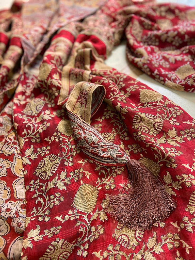 Reversible red and golden yellow cotton kalamkari and voile robe with balloon sleeves, side pockets, and tassel sash. Unique bohemian style sustainably created from vintage textiles by the Pavilion Parade Studio