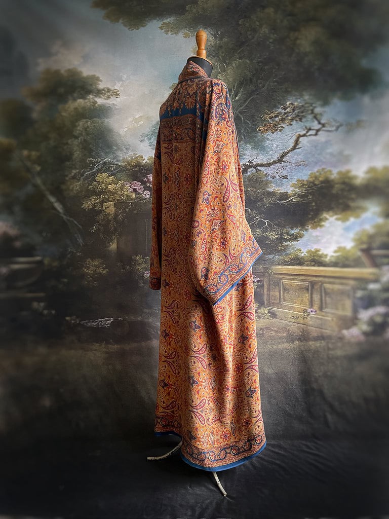 Saffron, red, and cerulean blue paisley silk crepe 1920s inspired kimono robe. Bohemian styles sustainably created from vintage textiles by the Pavilion Parade studio.