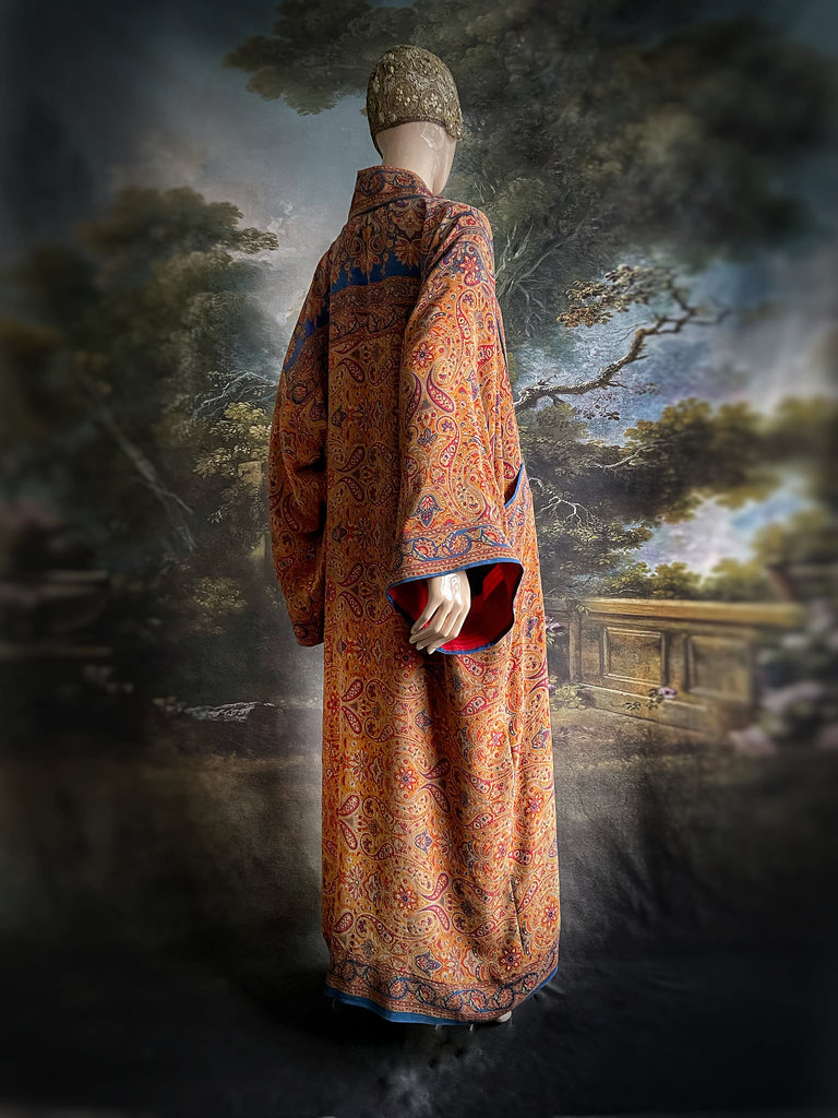 Saffron, red, and cerulean blue paisley silk crepe 1920s inspired kimono robe. Bohemian styles sustainably created from vintage textiles by the Pavilion Parade studio.