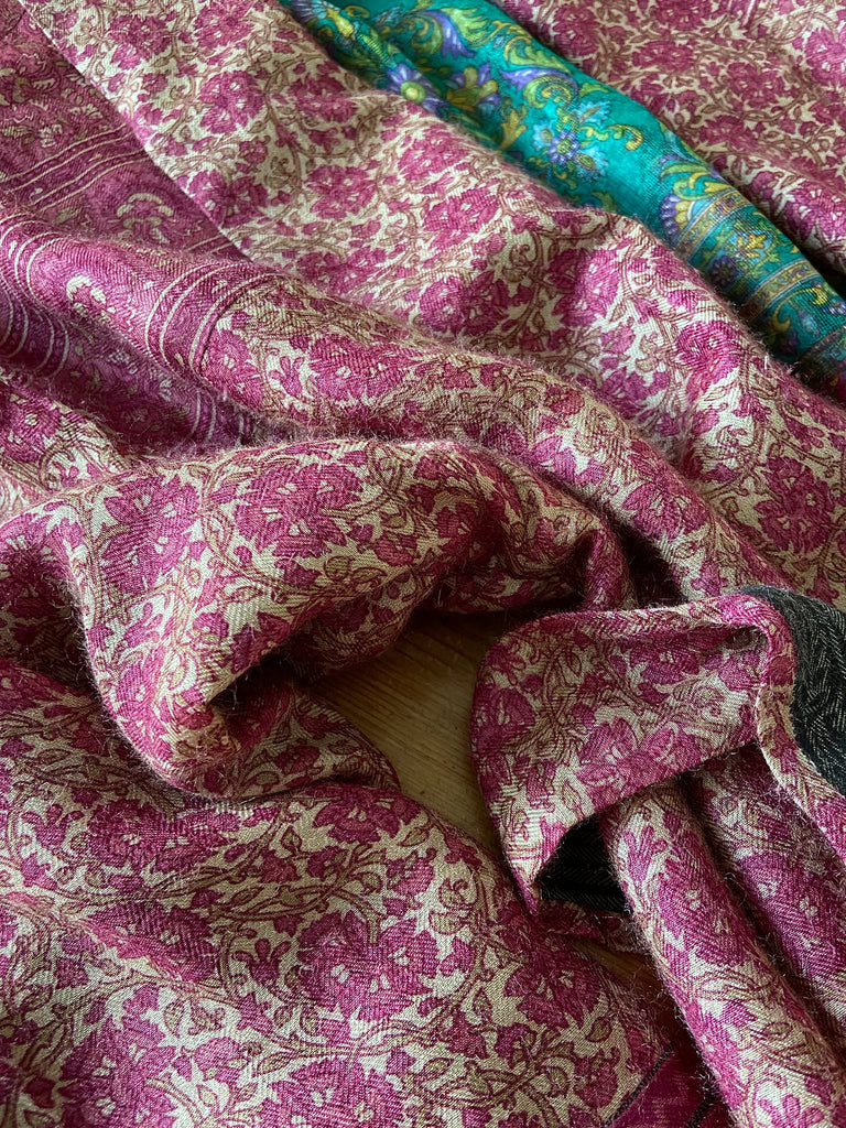 Rose pink silk lined fine wool dressing robe with wide sleeves, deep pockets and tassel sash. Bohemian styles sustainably created from antique and vintage textiles by the Pavilion Parade studio