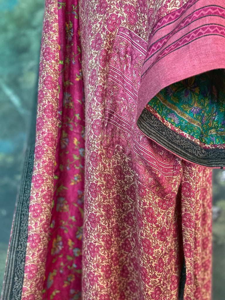 Rose pink silk lined fine wool dressing robe with wide sleeves, deep pockets and tassel sash. Bohemian styles sustainably created from antique and vintage textiles by the Pavilion Parade studio