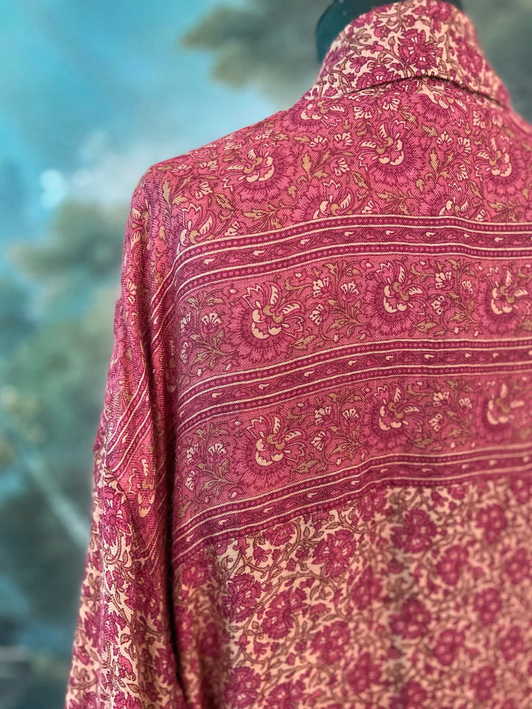 Rose pink silk lined fine wool dressing robe with wide sleeves, deep pockets and tassel sash. Bohemian styles sustainably created from antique and vintage textiles by the Pavilion Parade studio