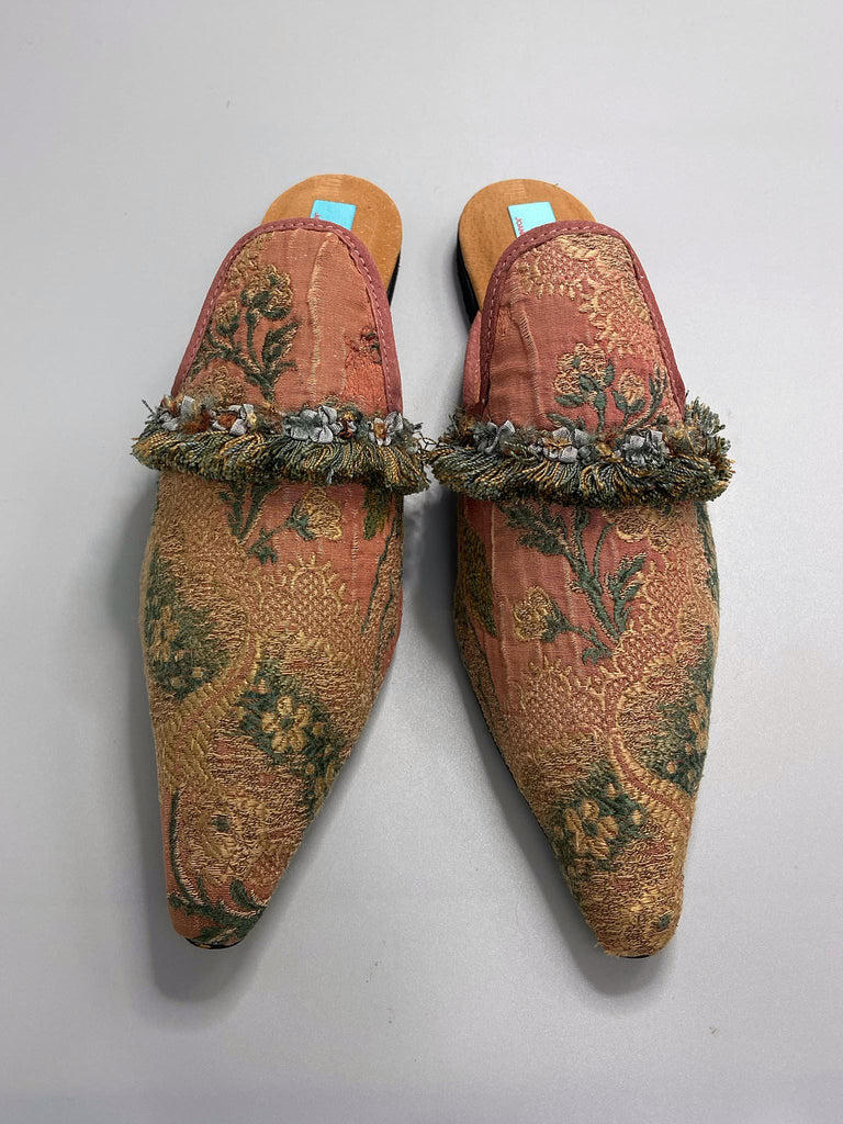 Muted rose pink and slate blue silk brocade pointed toe shoes with tassel fringe and rococo ribbon trims. Created from antique textiles by the Pavilion Parade Studio