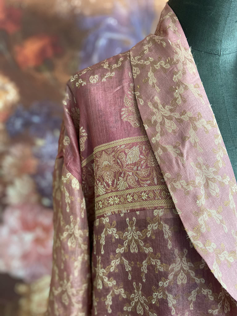 Rose pink and platinum lightweight luxury silk wrapper robe with wide sleeves, large patch pockets and tassel sash. Bohemian style created from antique and vintage textiles by the Pavilion Parade studio.