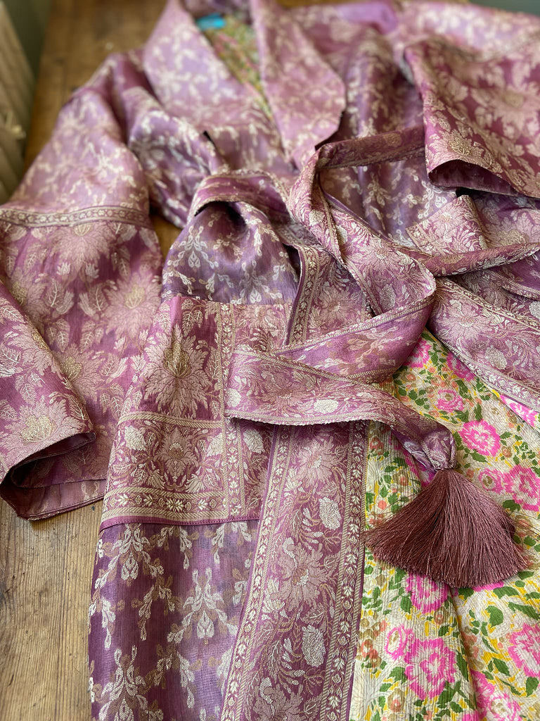 Rose pink and platinum lightweight luxury silk wrapper robe with wide sleeves, large patch pockets and tassel sash. Bohemian style created from antique and vintage textiles by the Pavilion Parade studio.
