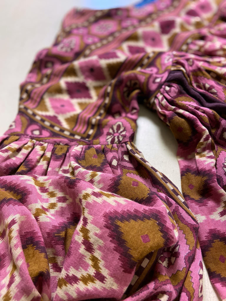 Rose pink and amber fine cotton muslin bohemian dress with full sleeves and pockets. Created from antique and vintage textiles by the Pavilion Parade studio