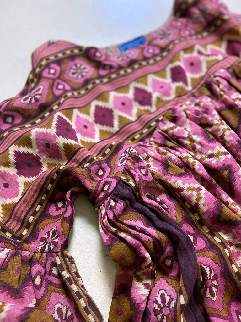 Rose pink and amber fine cotton muslin bohemian dress with full sleeves and pockets. Created from antique and vintage textiles by the Pavilion Parade studio