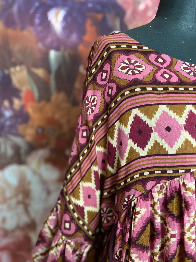 Rose pink and amber fine cotton muslin bohemian dress with full sleeves and pockets. Created from antique and vintage textiles by the Pavilion Parade studio