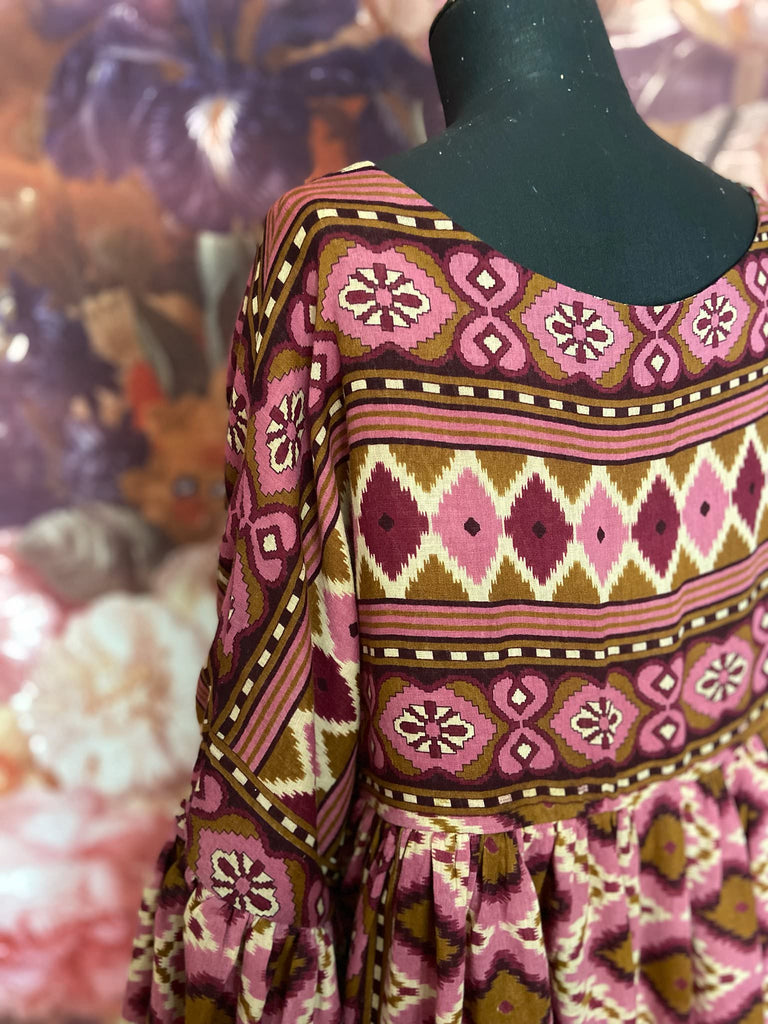 Rose pink and amber fine cotton muslin bohemian dress with full sleeves and pockets. Created from antique and vintage textiles by the Pavilion Parade studio