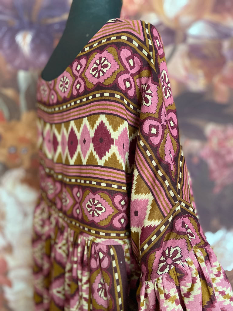 Rose pink and amber fine cotton muslin bohemian dress with full sleeves and pockets. Created from antique and vintage textiles by the Pavilion Parade studio