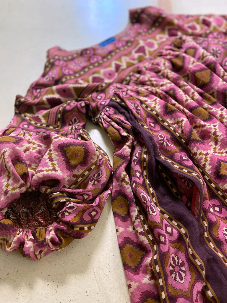 Rose pink and amber fine cotton muslin bohemian dress with full sleeves and pockets. Created from antique and vintage textiles by the Pavilion Parade studio