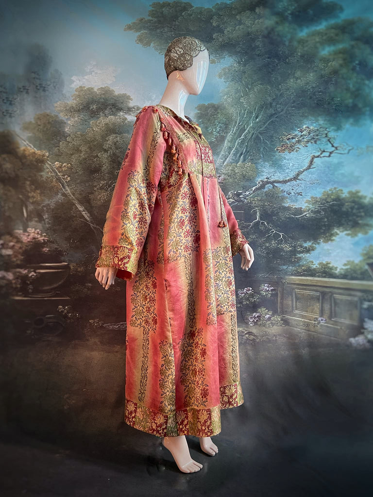 Rose Pink Silk Kaftan Maxi Dress with pockets and antique tassel trim.  Unique bohemian styles created from antique and vintage textiles by the Pavilion Parade Studio.