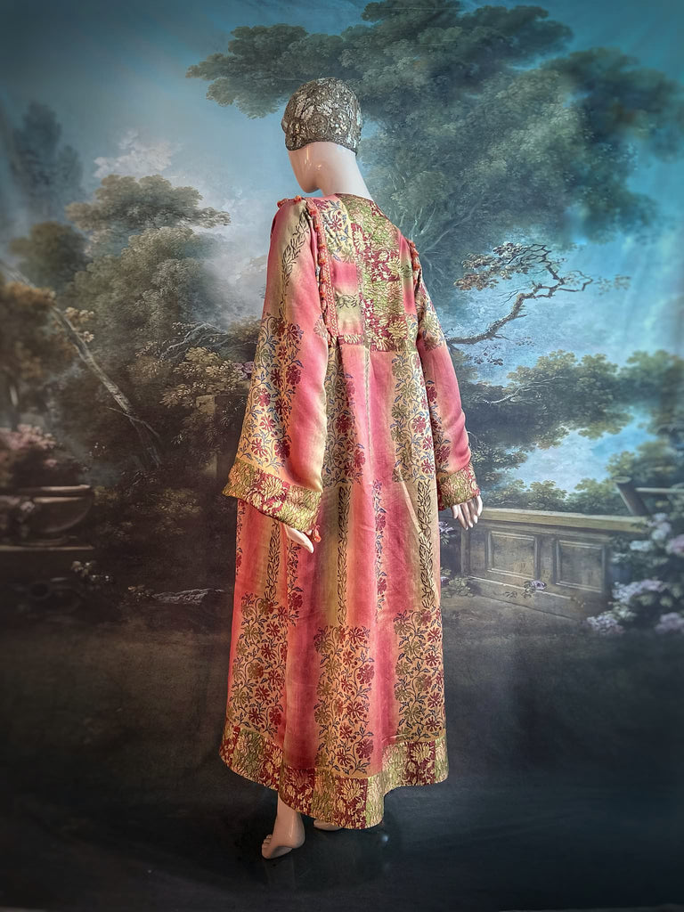 Rose Pink Silk Kaftan Maxi Dress with pockets and antique tassel trim.  Unique bohemian styles created from antique and vintage textiles by the Pavilion Parade Studio.
