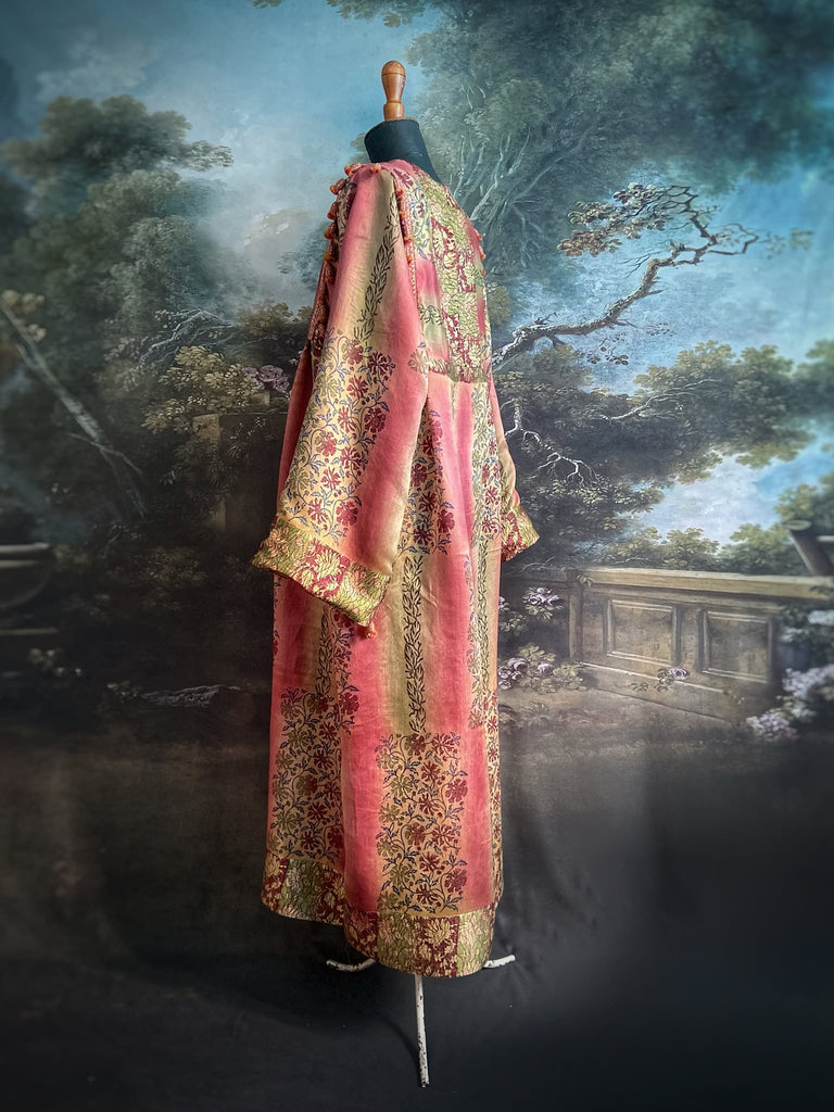 Rose Pink Silk Kaftan Maxi Dress with pockets and antique tassel trim.  Unique bohemian styles created from antique and vintage textiles by the Pavilion Parade Studio.