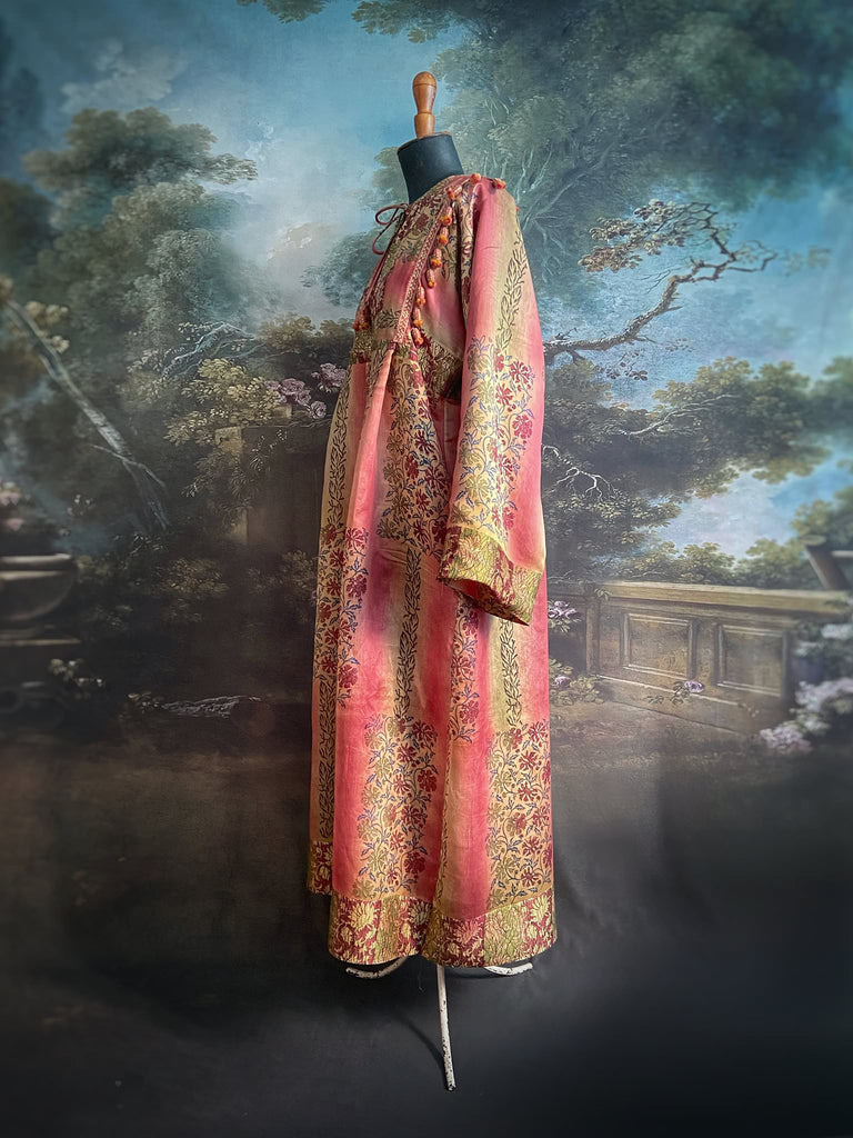 Rose Pink Silk Kaftan Maxi Dress with pockets and antique tassel trim.  Unique bohemian styles created from antique and vintage textiles by the Pavilion Parade Studio.