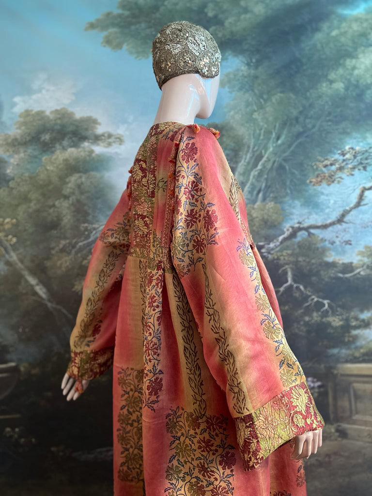 Rose Pink Silk Kaftan Maxi Dress with pockets and antique tassel trim.  Unique bohemian styles created from antique and vintage textiles by the Pavilion Parade Studio.