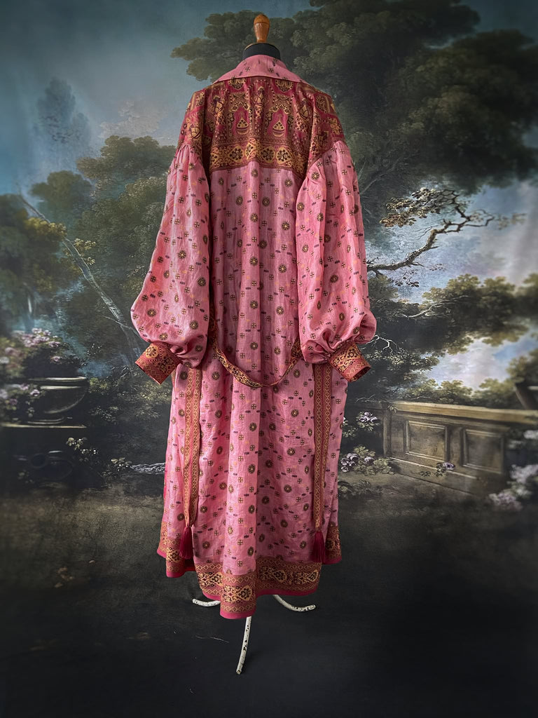 Rose pink and carmine lightweight silk wrapper robe with full sleeves, large patch pockets and tassel sash. Bohemian style created from antique and vintage textiles by the Pavilion Parade studio.