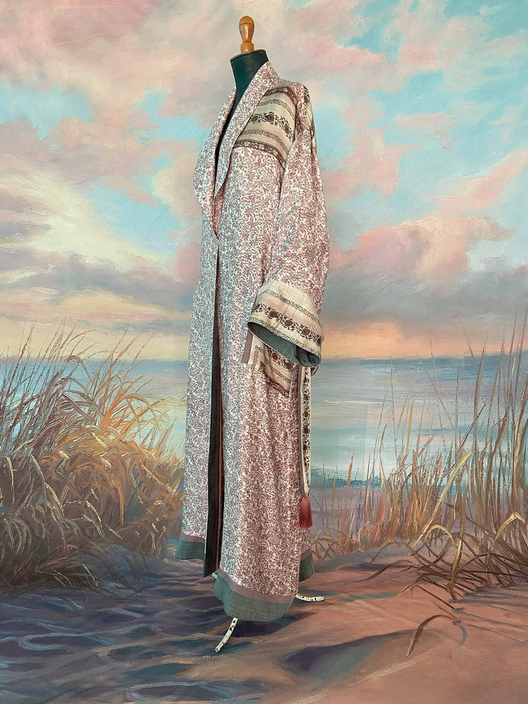 Fine wool robe lined in silk, with wide sleeves, deep pockets and tassel sash. Bohemian styles created from vintage and antique textiles by the Pavilion Parade studio. 