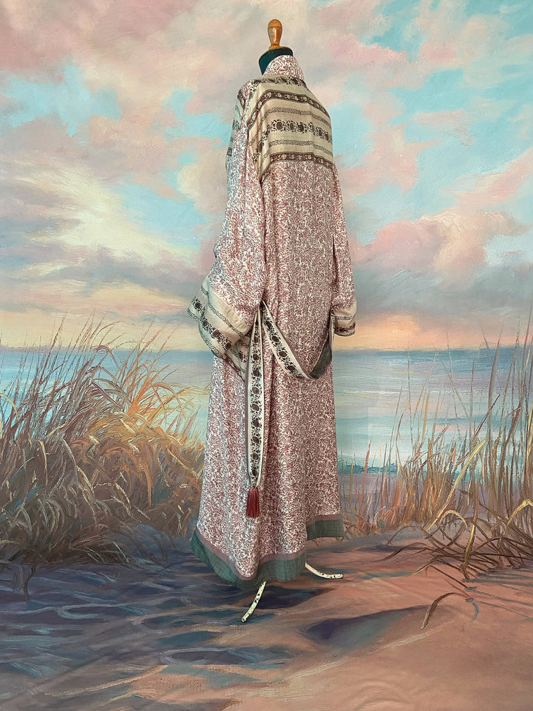 Fine wool robe lined in silk, with wide sleeves, deep pockets and tassel sash. Bohemian styles created from vintage and antique textiles by the Pavilion Parade studio. 