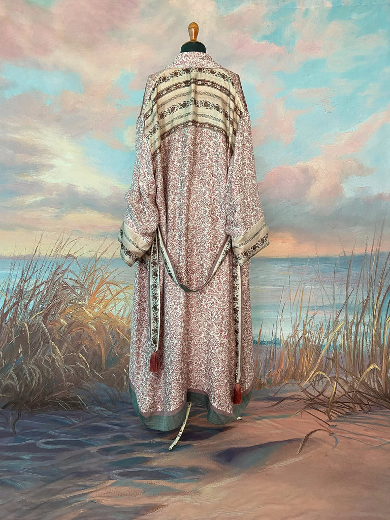 Fine wool robe lined in silk, with wide sleeves, deep pockets and tassel sash. Bohemian styles created from vintage and antique textiles by the Pavilion Parade studio. 