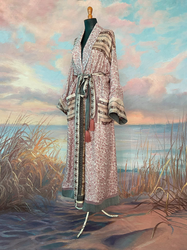 Fine wool robe lined in silk, with wide sleeves, deep pockets and tassel sash. Bohemian styles created from vintage and antique textiles by the Pavilion Parade studio. 