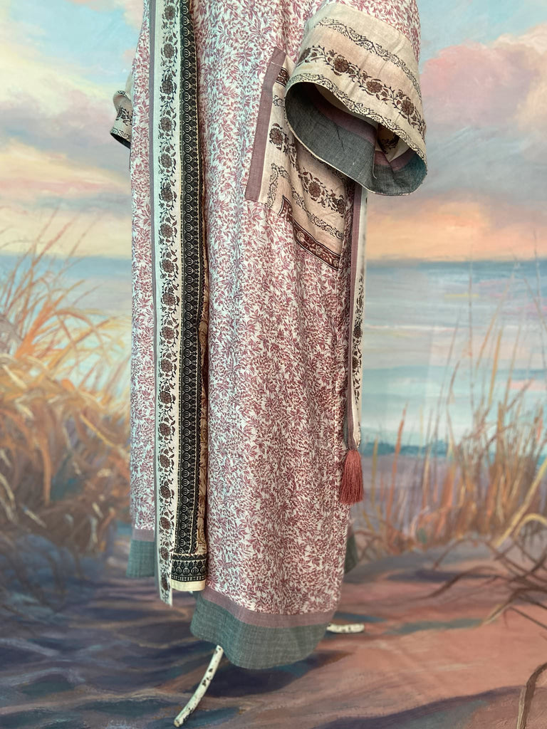 Fine wool robe lined in silk, with wide sleeves, deep pockets and tassel sash. Bohemian styles created from vintage and antique textiles by the Pavilion Parade studio. 