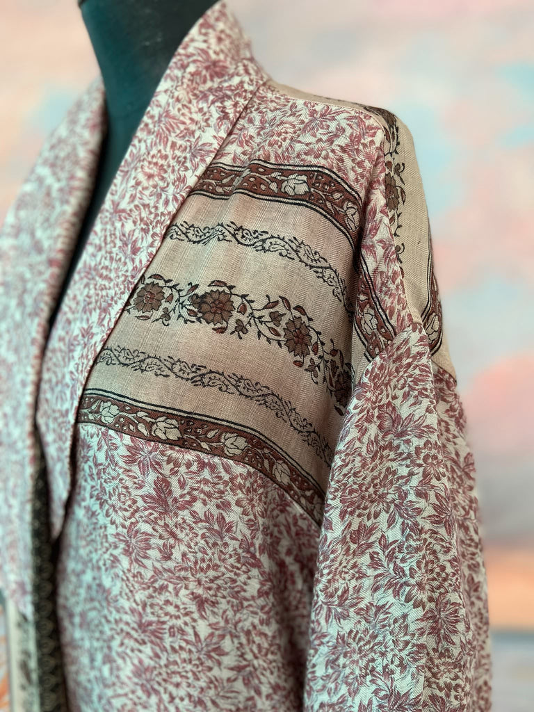 Fine wool robe lined in silk, with wide sleeves, deep pockets and tassel sash. Bohemian styles created from vintage and antique textiles by the Pavilion Parade studio. 