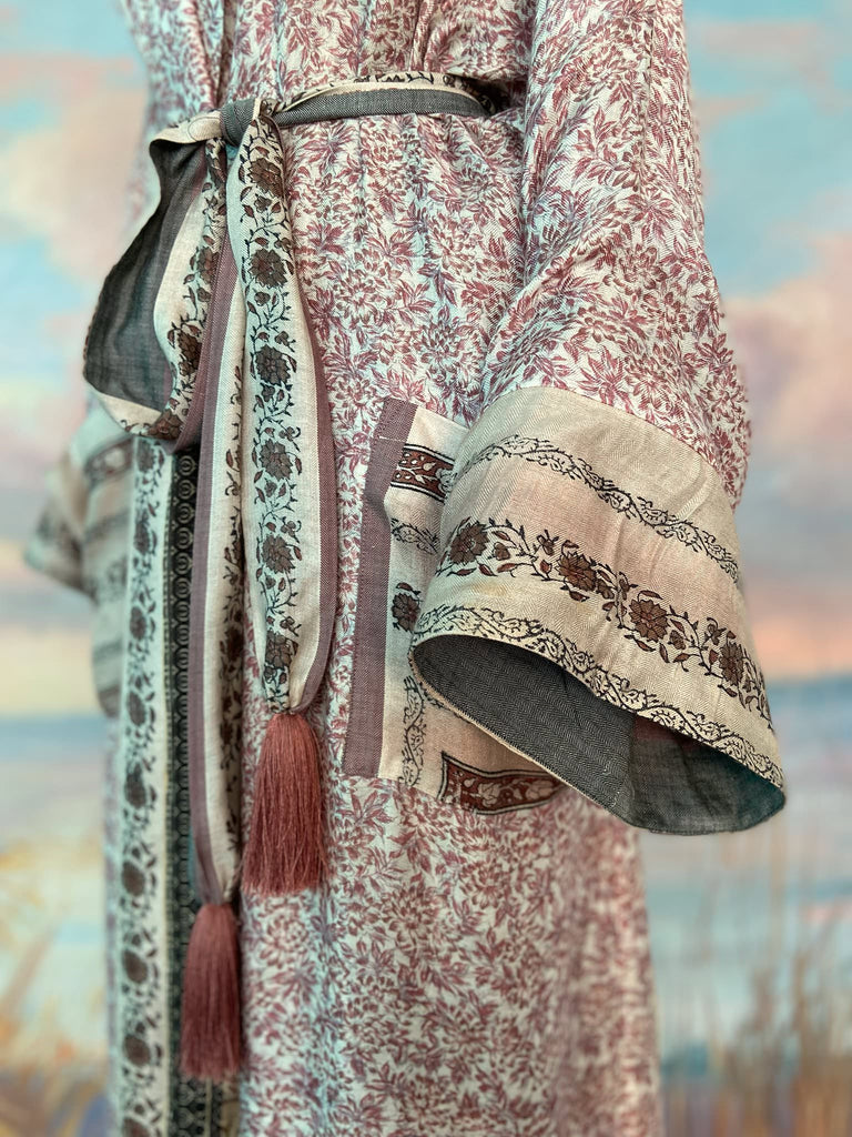 Fine wool robe lined in silk, with wide sleeves, deep pockets and tassel sash. Bohemian styles created from vintage and antique textiles by the Pavilion Parade studio. 