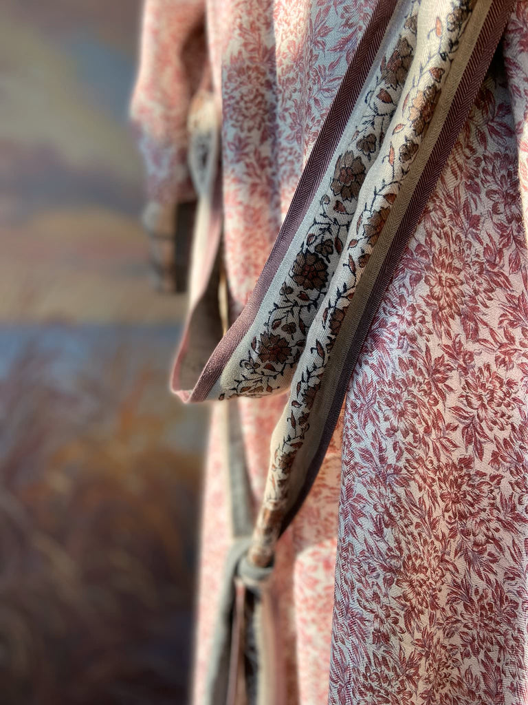 Fine wool robe lined in silk, with wide sleeves, deep pockets and tassel sash. Bohemian styles created from vintage and antique textiles by the Pavilion Parade studio. 